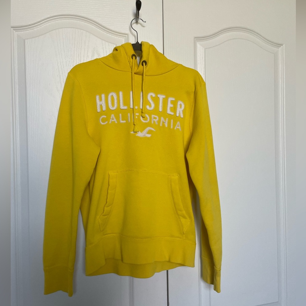 Yellow Hollister hoodie, size Medium.